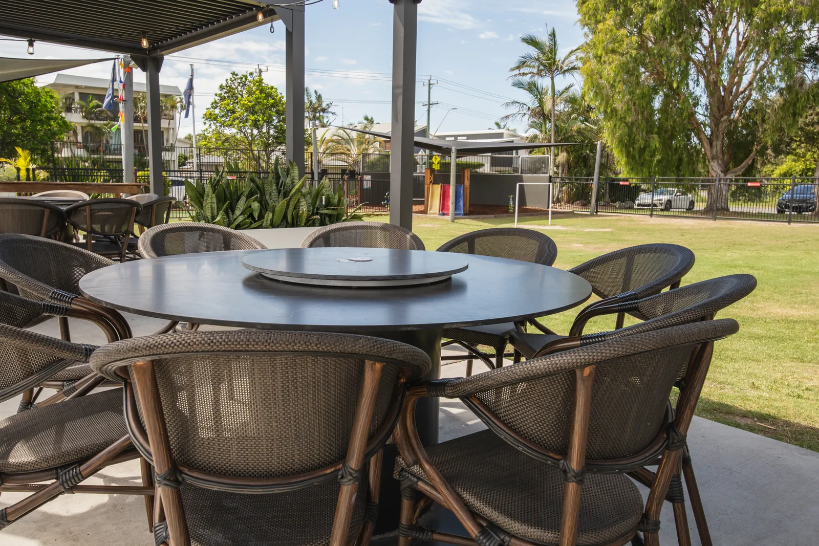 Tables set out on the lawn under the gazebos