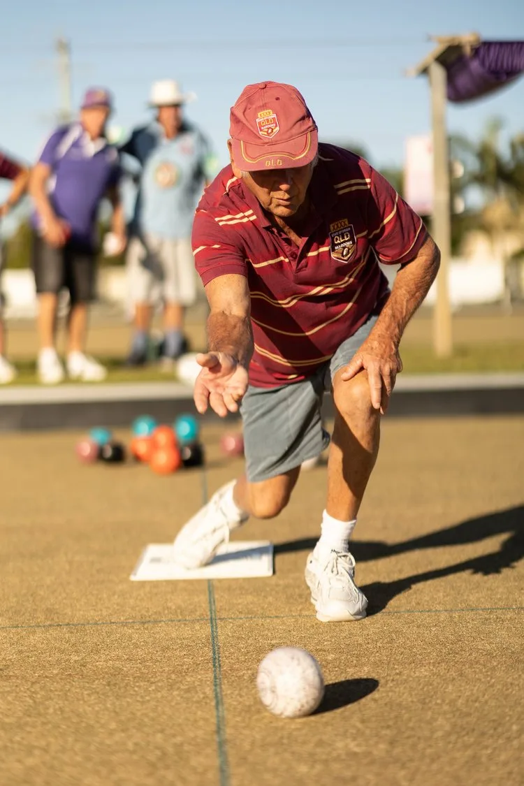 A bowler about to release on the green